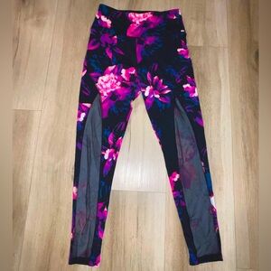 Victoria secrets Pink flowered Yoga Pants. Size medium. In great condition.